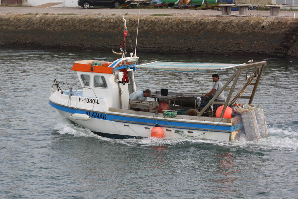 Fishing vessel with hook art from Olhão