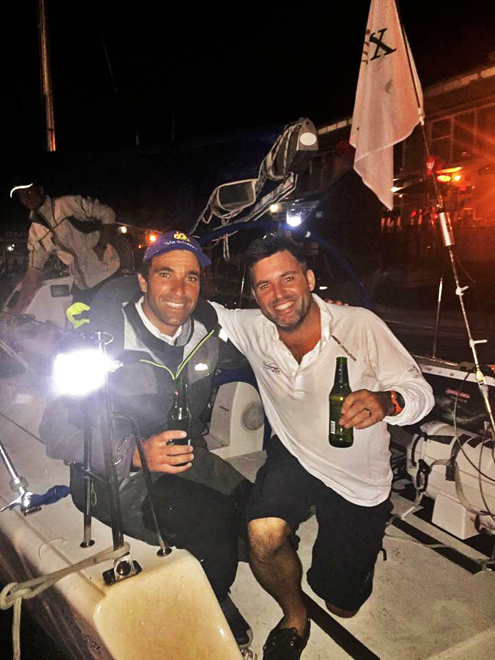 Luís Brito, with Alex Gilbert, celebrating, on arrival in Hobart