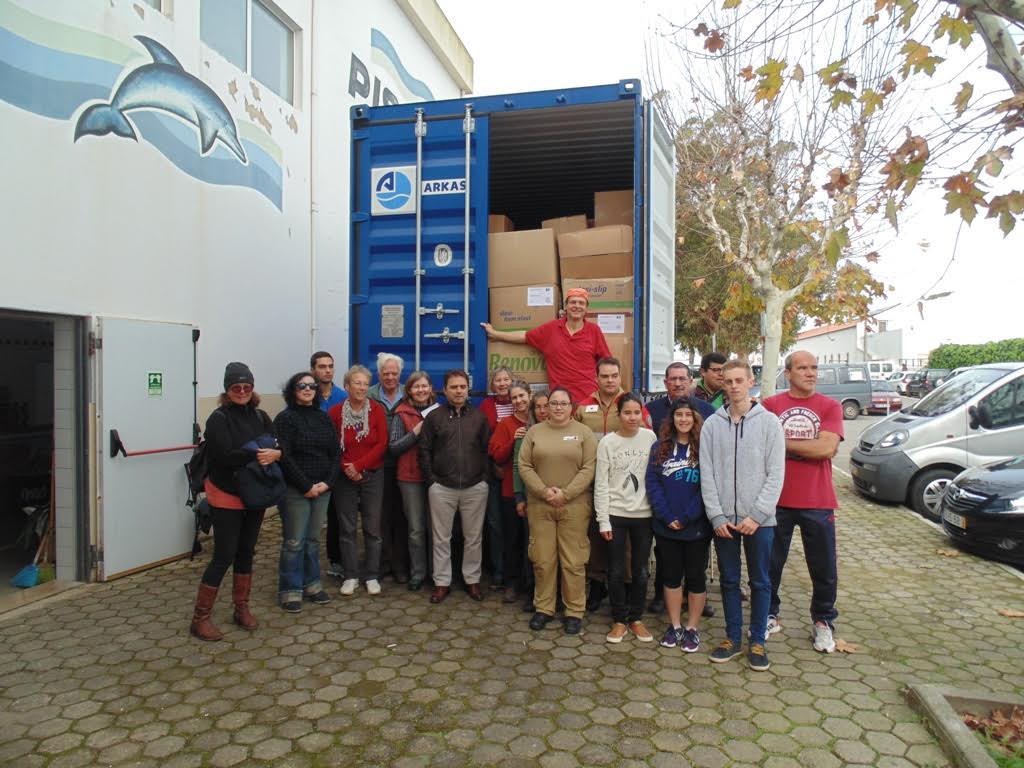 Group of volunteers who helped load the container