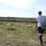 Sul Informação - 200 jovens escuteiros e bombeiros arrancaram toneladas de chorão das dunas de Alvor