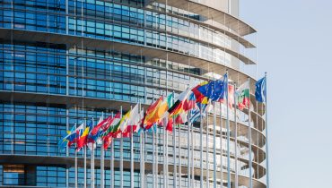 European Parliament facade with all EU European Union Country fl