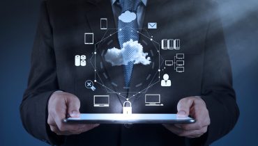 Businessman working with a Cloud Computing diagram on the new co